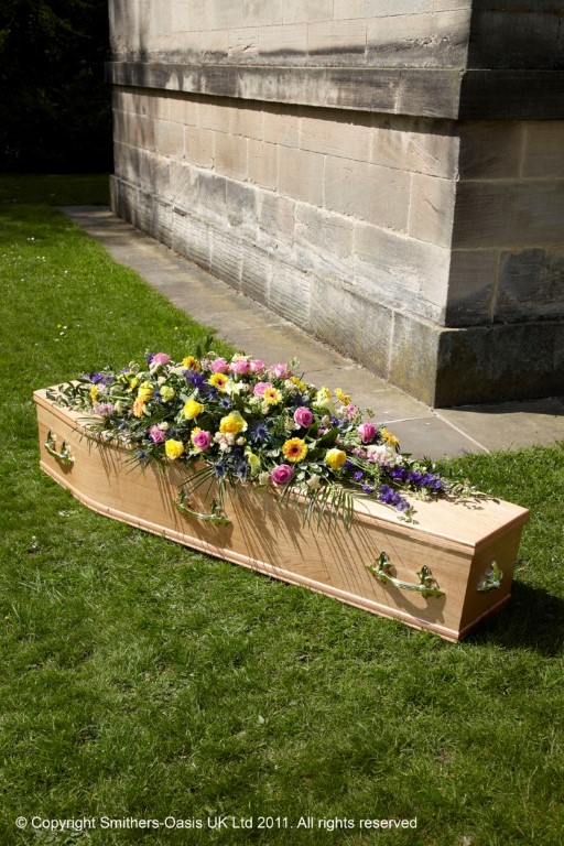 Colourful casket spray